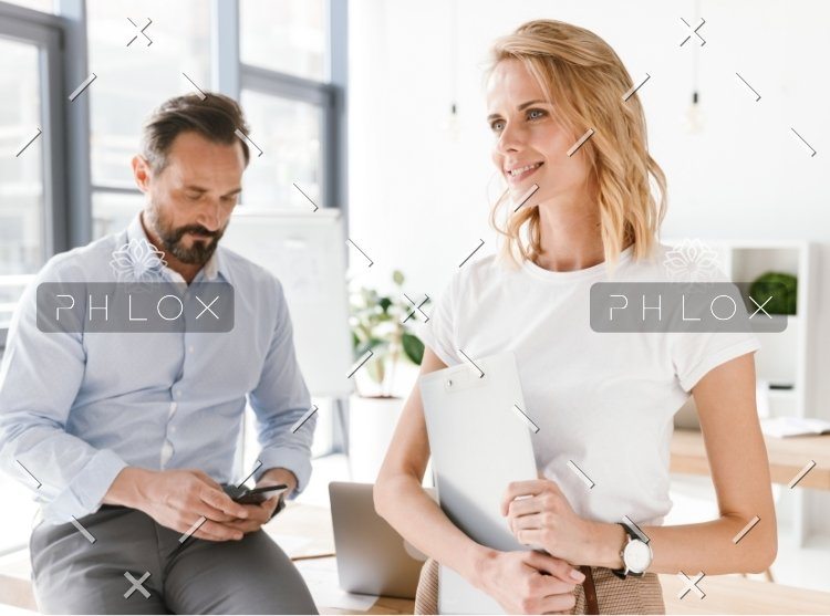 confident-man-manager-using-mobile-phone-PKUB4RV@2x